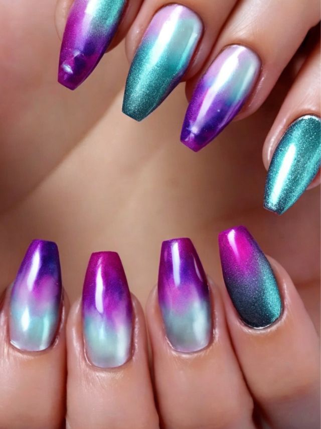 A woman's nails with stunning purple, blue, and green ombre designs.