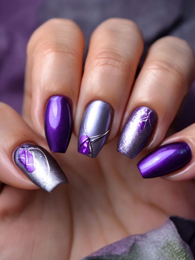 A woman's nails adorned with intricate purple and silver designs, perfect for wedding nail ideas and inspiration.