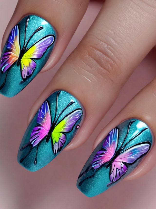 A woman's nails with colorful butterflies painted on them.