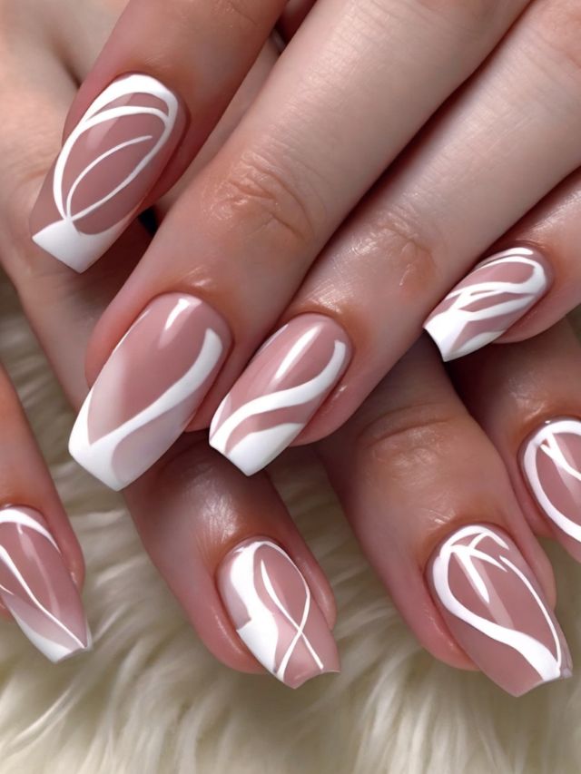 A woman's hands with white and beige nails.