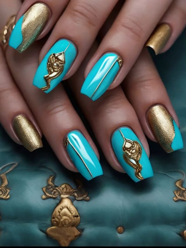 A woman's nails with gold and turquoise designs.