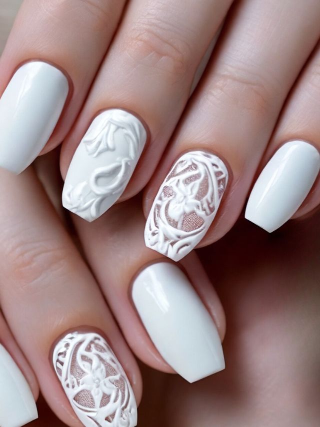 Cute white nails with delicate lace designs, perfect for Easter.