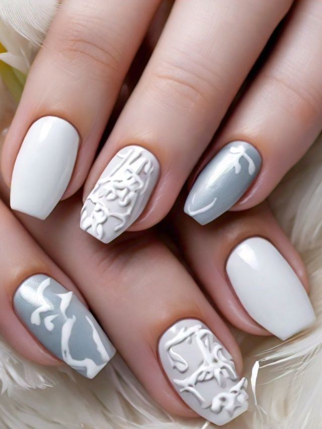 A woman's hands with cute and white nail designs.