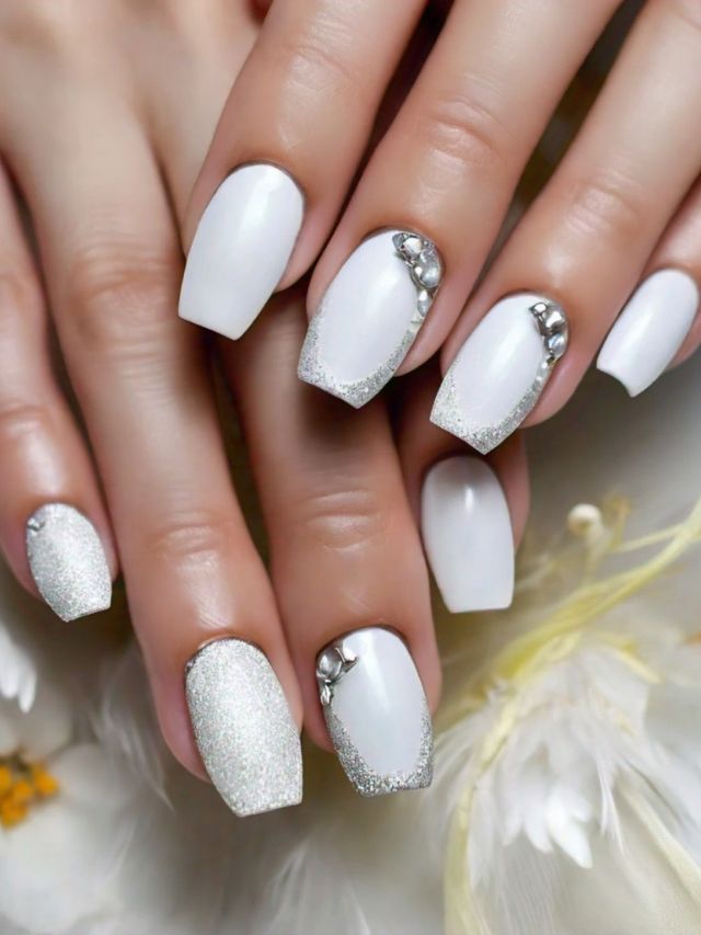 A woman's hands with cute white nails.