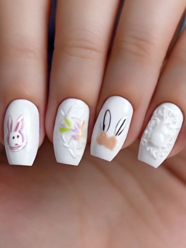A woman showcases a cute white Easter nail design featuring a bunny-shaped accent.